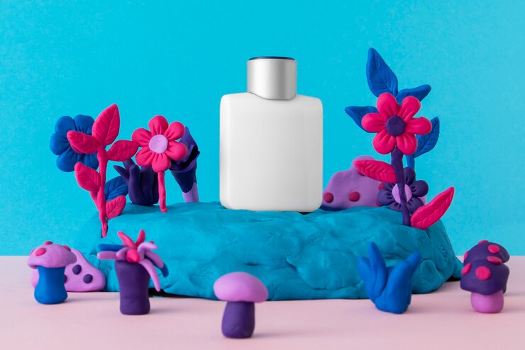 Foto gratuito frasco de perfume a base de ingredientes del suelo.