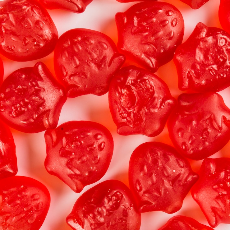 Foto gratuito fresas de gelatina de close-up