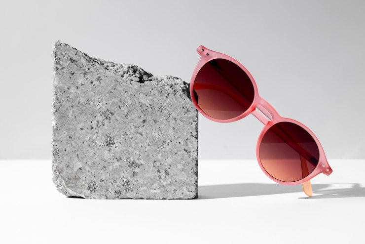 Foto gratuito gafas con marcos redondeados naturaleza muerta