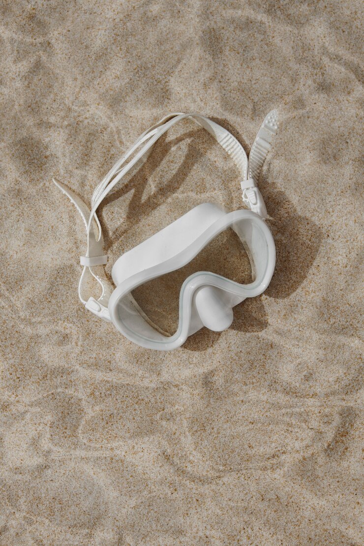 Gafas de natación bajo el agua bodegón