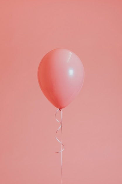 Un globo rosa