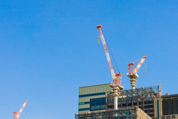 Foto gratuita grúa y la obra de construcción