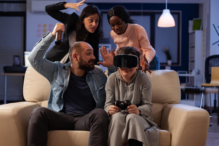 Foto gratuito grupo multiétnico de colegas jugando videojuegos con gafas vr en la fiesta de la oficina después de las horas de trabajo. mujer triste perdiendo el juego en la consola con auriculares y controlador de realidad virtual.