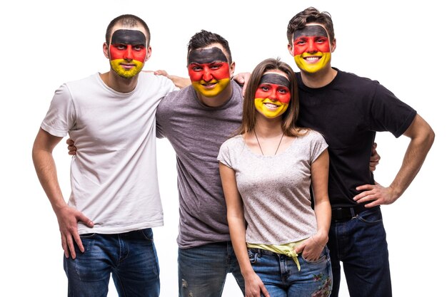 Grupo de seguidores de personas aficionados de los equipos nacionales de Alemania con cara de bandera pintada sonrisa emociones felices. Fans de las emociones.