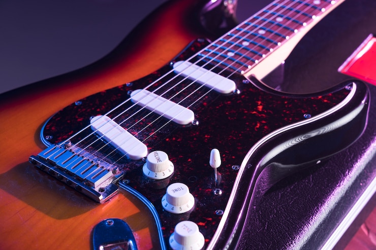 Foto gratuito guitarra eléctrica de alta vista en el escenario