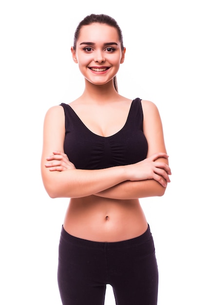 Hermosa joven mujer musculosa deportiva, aislada sobre fondo blanco