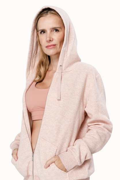 Hermosa mujer vistiendo ropa deportiva rosa coordinado vista frontal