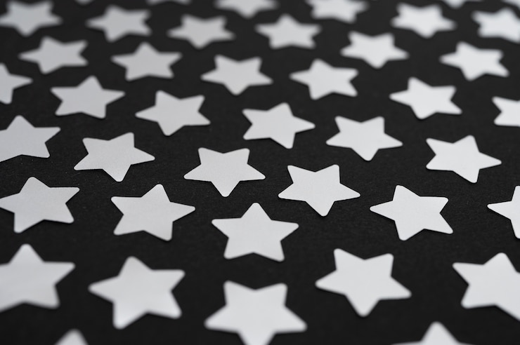 Foto gratuito hermoso fondo de estrellas plateadas