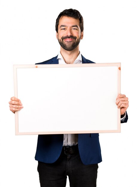 Hermoso hombre con un cartel vacío