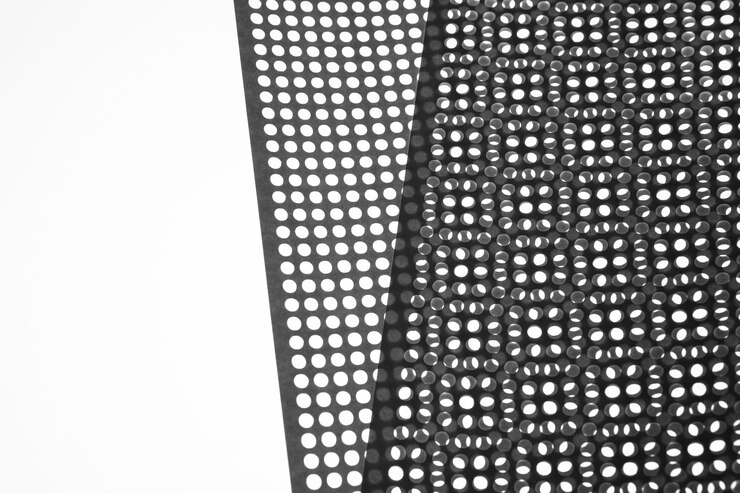 Foto gratuito hoja de material perforado con pequeños agujeros