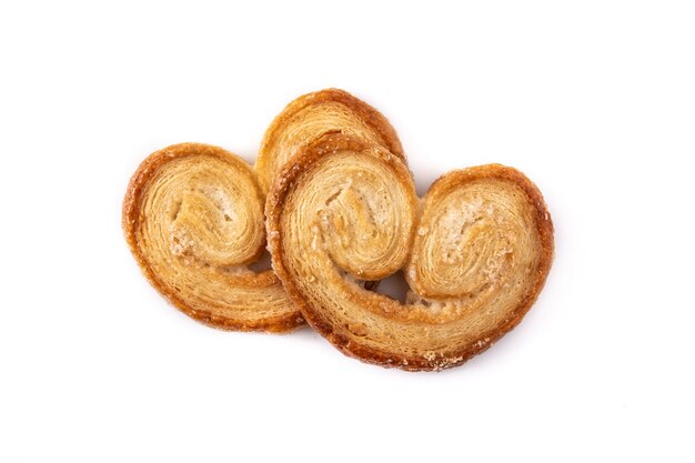 Hojaldre Palmier aislado sobre fondo blanco.