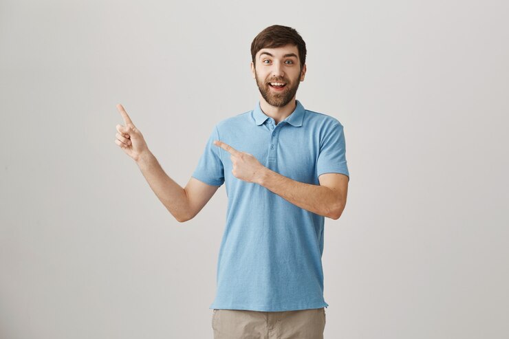 Foto gratuito hombre barbudo joven alegre posando