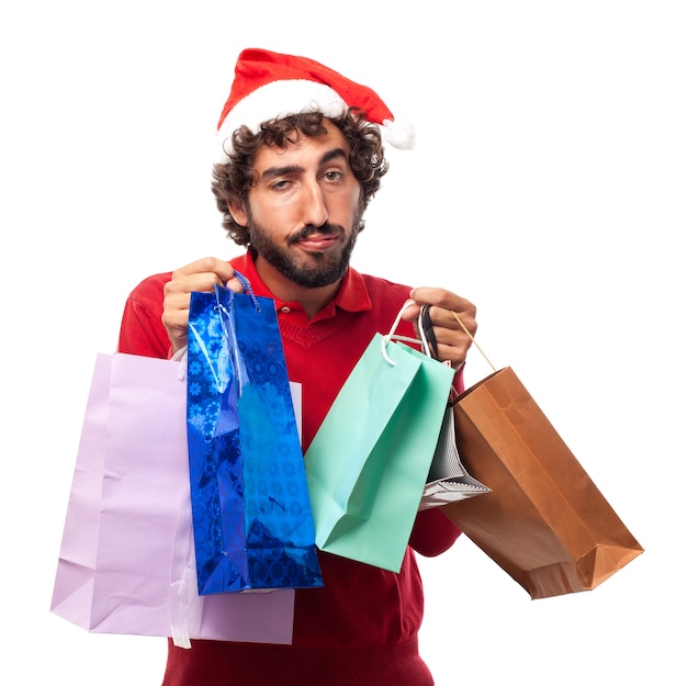 Hombre cansado con bolsas de la compra