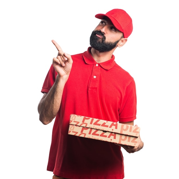 Foto gratuita hombre de la entrega de pizza pensando