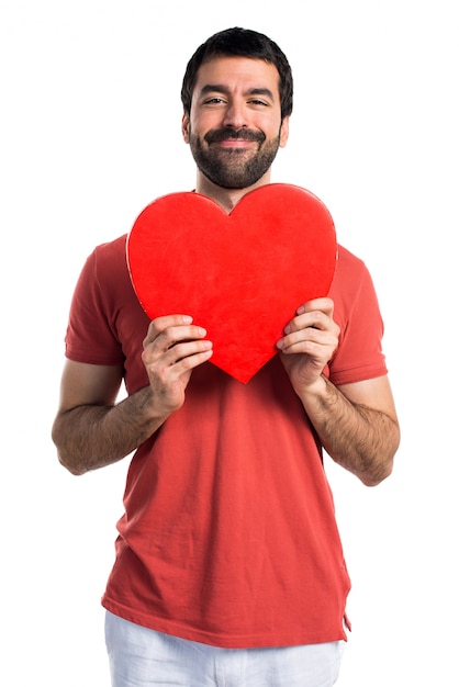 Hombre guapo con un icono del corazón