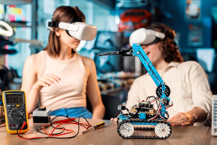 Foto gratuito hombre y mujer jóvenes con gafas vr haciendo experimentos en robótica en un laboratorio robot y herramientas