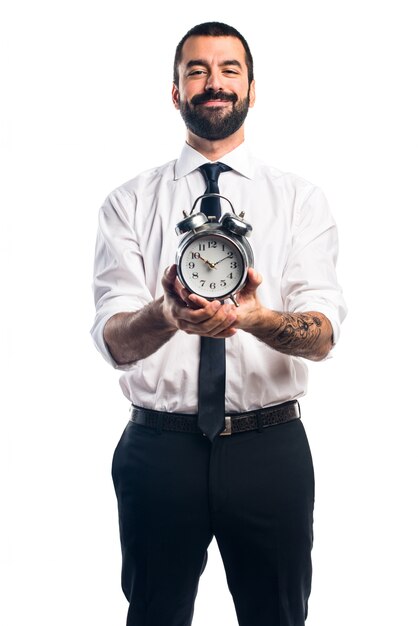 Hombre de negocios la celebración de reloj de época