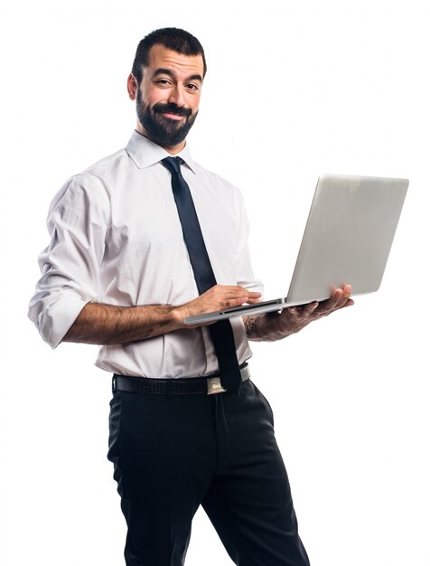 Hombre de negocios con la computadora portátil