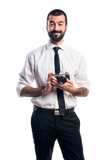 Foto gratuita hombre de negocios fotografiando