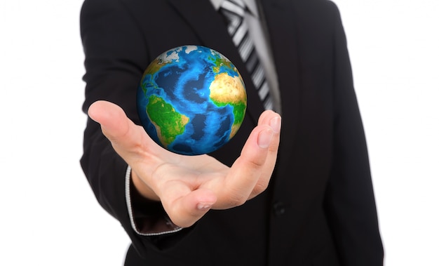 Foto gratuita hombre de negocios con un globo terráqueo en la mano