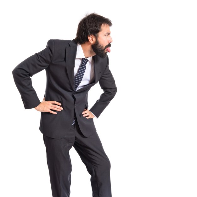 Hombre de negocios haciendo una broma sobre fondo blanco aislado