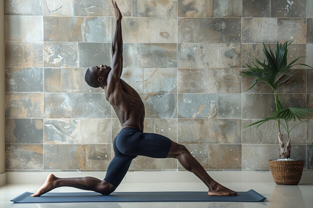 Foto gratuita hombre negro en plena sesión practicando yoga