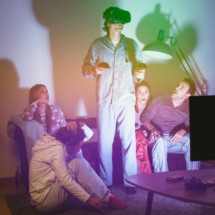 Foto gratuito hombre en pijamas con gafas de realidad virtual