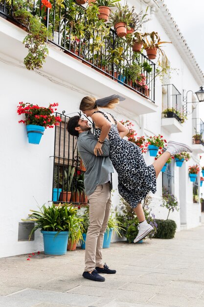 Hombre de tiro completo, tenencia, mujer