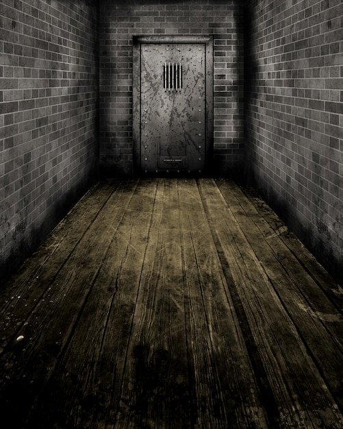 Imagen de estilo grunge del pasillo que conduce a una antigua puerta de la prisión