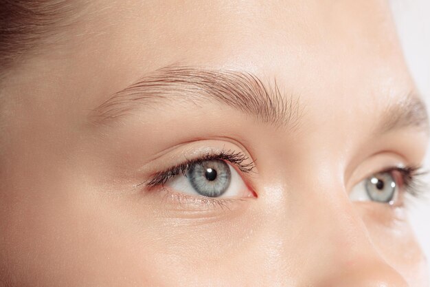 Imagen de primer plano de hermosos ojos femeninos Concepto de cosmetología de belleza natural