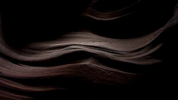 Impresionante paisaje de hermosas texturas de arena en la oscuridad en antelope canyon, ee.uu.