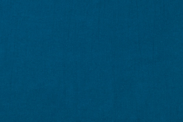 Impresiones en bloque de tela de fondo con textura lisa azul índigo