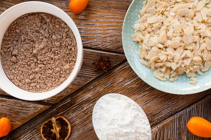 Foto gratuito ingredientes de pastel con tazón de harina