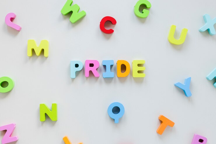 Foto gratuito inscripción de letras pequeñas en el orgullo.