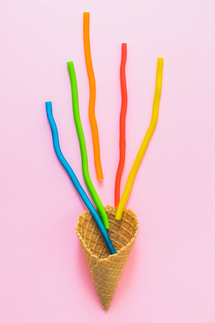 Foto gratuito jelly sticks en cono de gofres