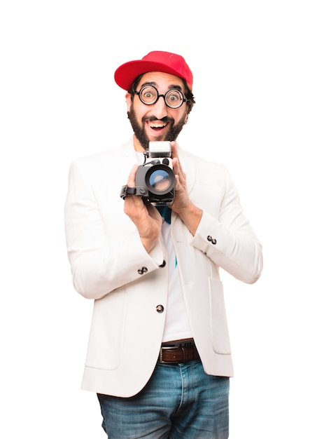 Foto gratuita joven loco de negocios con una cámara de cine