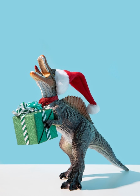 Juguete de dinosaurio con regalo