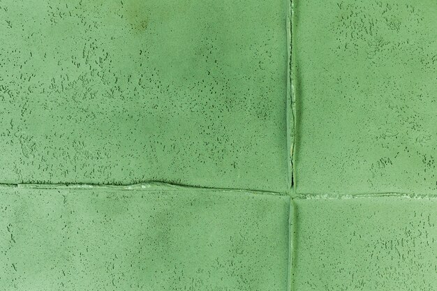 Junta de pared verde con textura rugosa