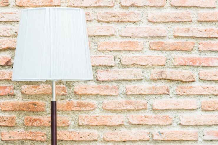Foto gratuito lámpara de luz con espacio de copia en la pared