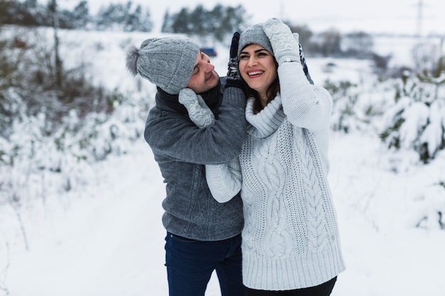 Laughing couple in nature