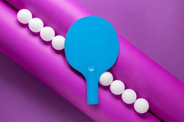 Lay Flat de pelotas de ping pong y paleta