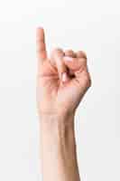 Foto gratuita lenguaje de señas gesticular de primer plano de la mano