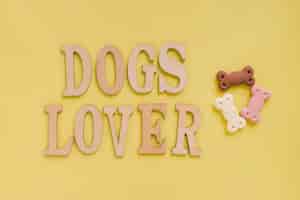 Foto gratuita letras de amante de perros con golosinas