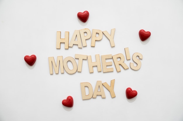 Foto gratuita lettering del día de la madre y corazones