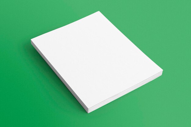 Libro en blanco sobre fondo verde