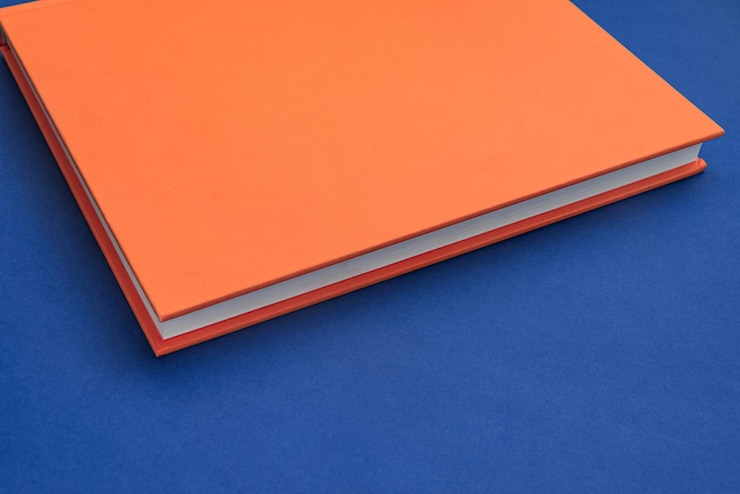 Foto gratuito libro de papel físico sobre primer plano de fondo