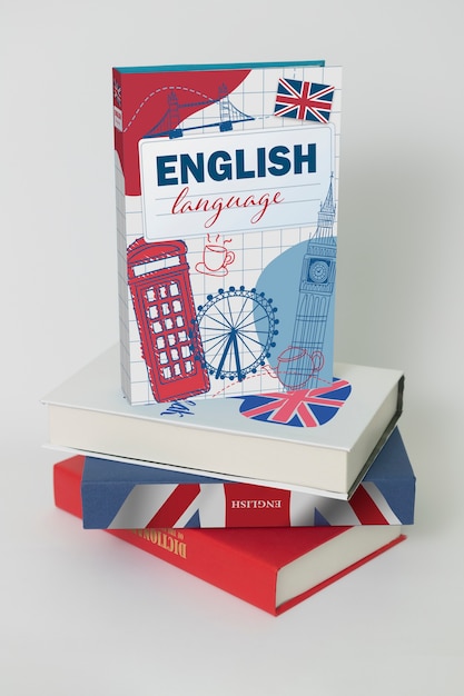 Foto gratuita libros ingleses con fondo blanco.