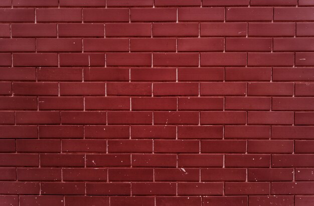 Llanura de pared de ladrillo rojo brillante
