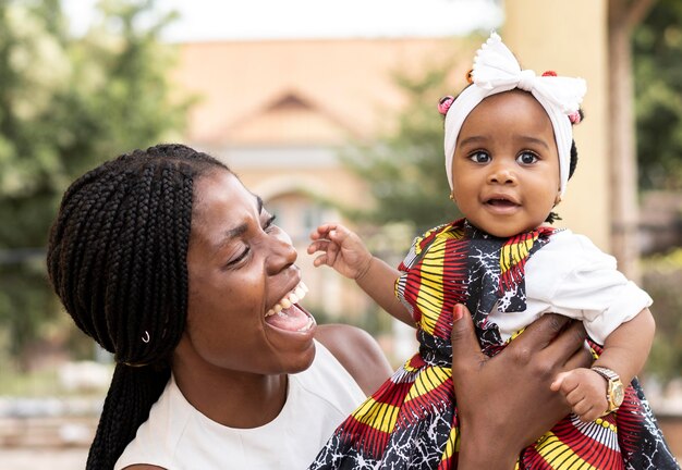 Madre africana, tenencia, niña