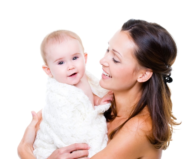 Foto gratuita madre feliz con bebé sonriente